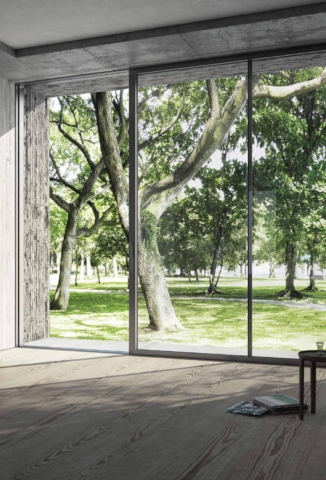 Bodentiefe Aluminium-Schiebetür mit Blick in den Park