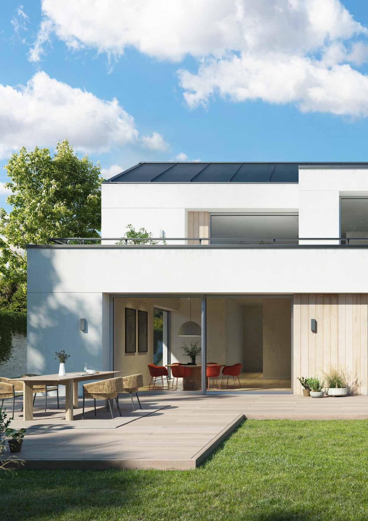 Modernes Haus mit großflächiger Aluminium-Hebeschiebetür zur Terrasse